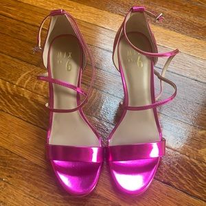 Brand new, never worn fuschia Strappy heels
